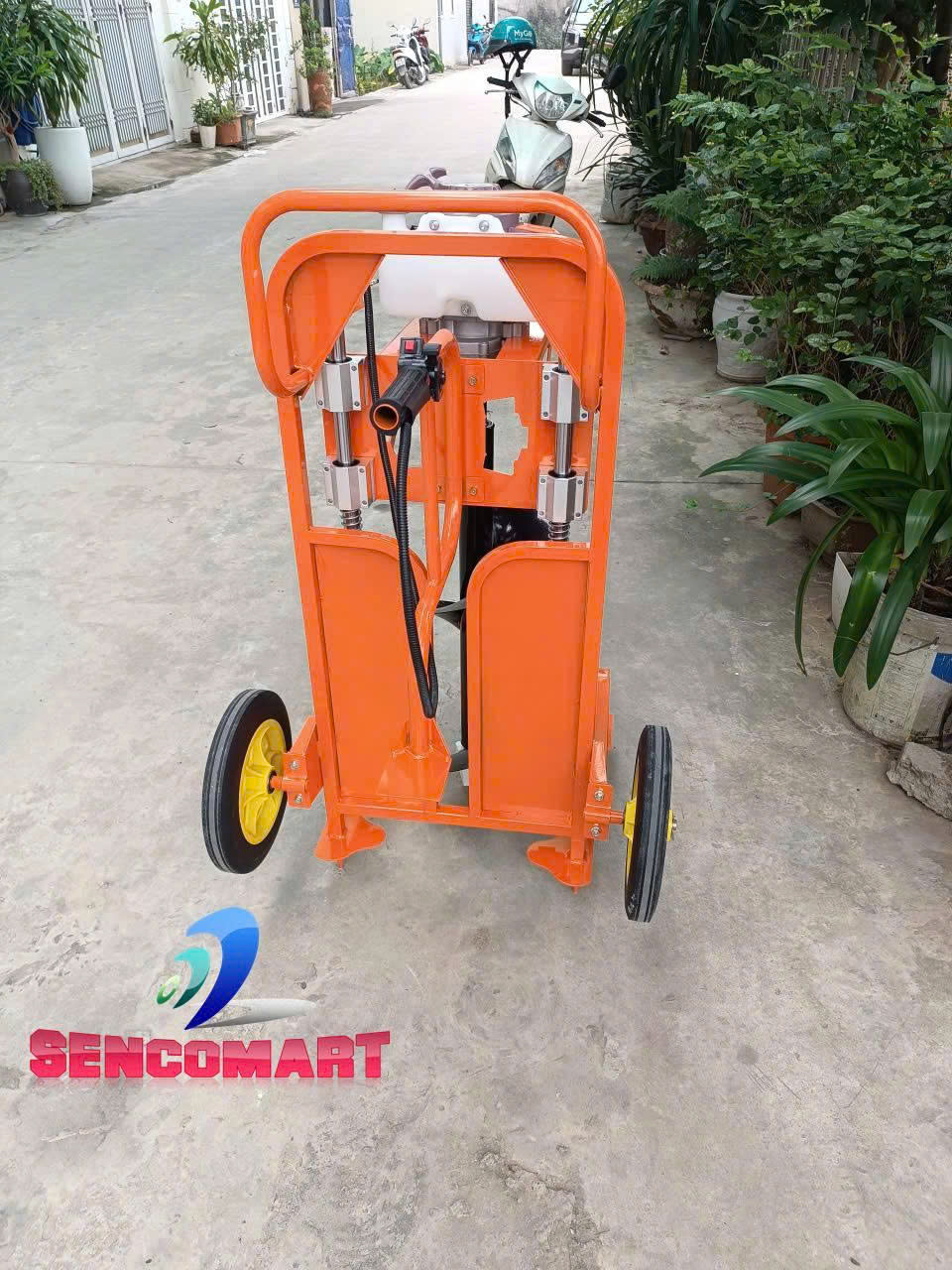 Máy khoan đất xe đẩy có lò xo giảm chấn dễ dùng Mitsubishi 68cc
